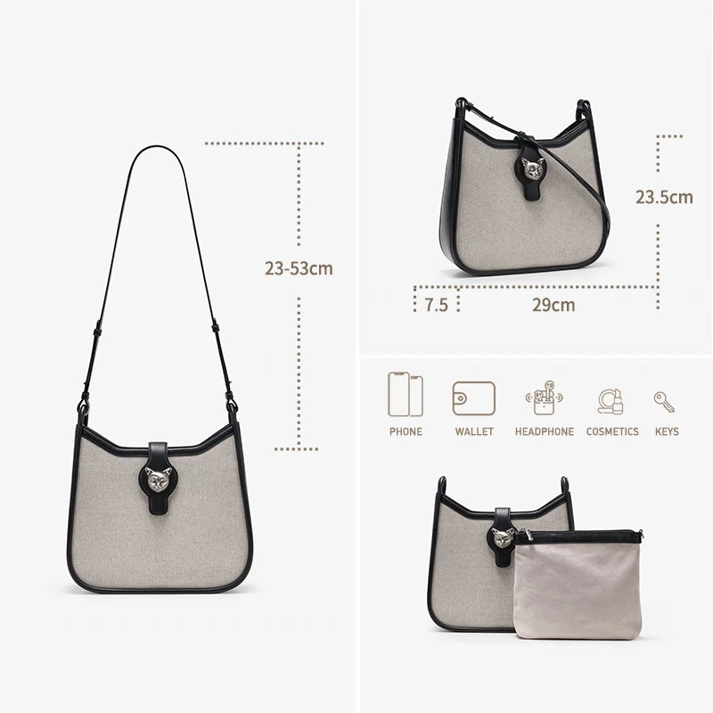 Beige Hobo-Umhängetasche mit schwarzem Besatz und Front-Pouch mit Reißverschluss.