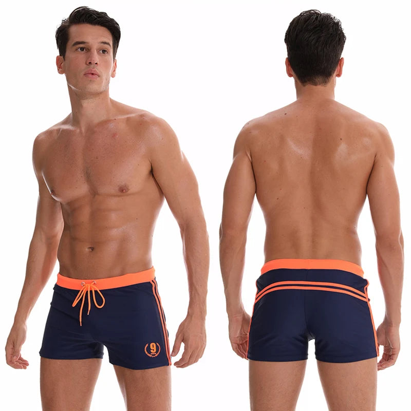 Lange Herren-Shorts mit Polyesterfutter und seitlicher Reißverschlusstasche – ideal für Fitnessstudio und Schwimmen