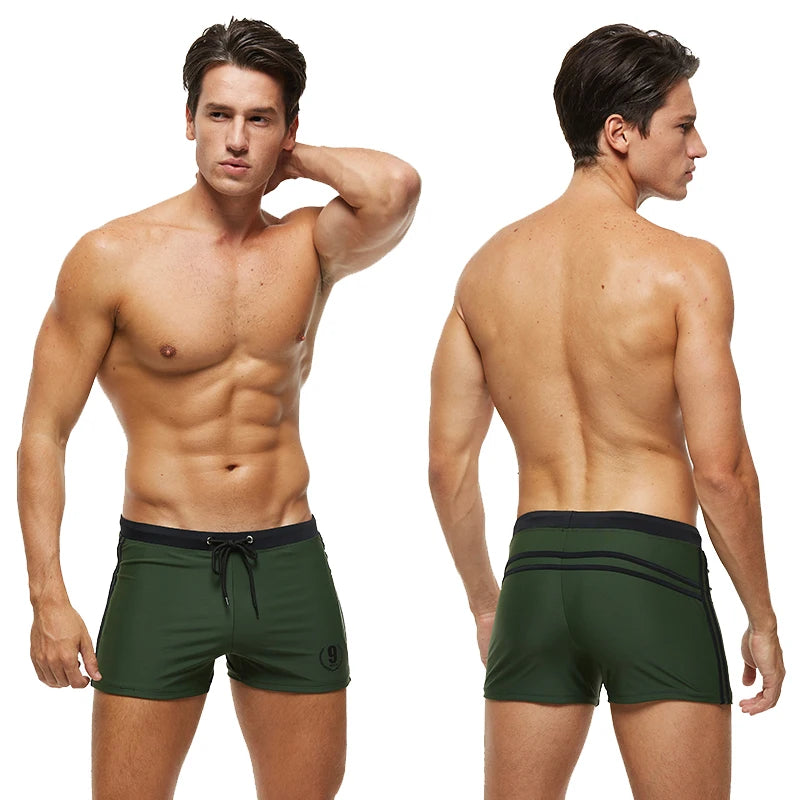 Lange Herren-Shorts mit Polyesterfutter und seitlicher Reißverschlusstasche – ideal für Fitnessstudio und Schwimmen