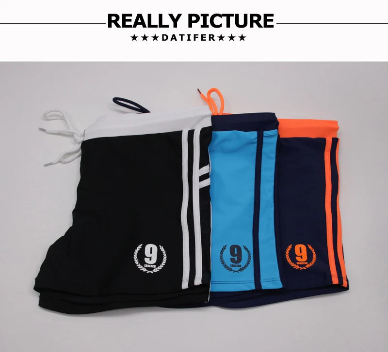 Lange Herren-Shorts mit Polyesterfutter und seitlicher Reißverschlusstasche – ideal für Fitnessstudio und Schwimmen