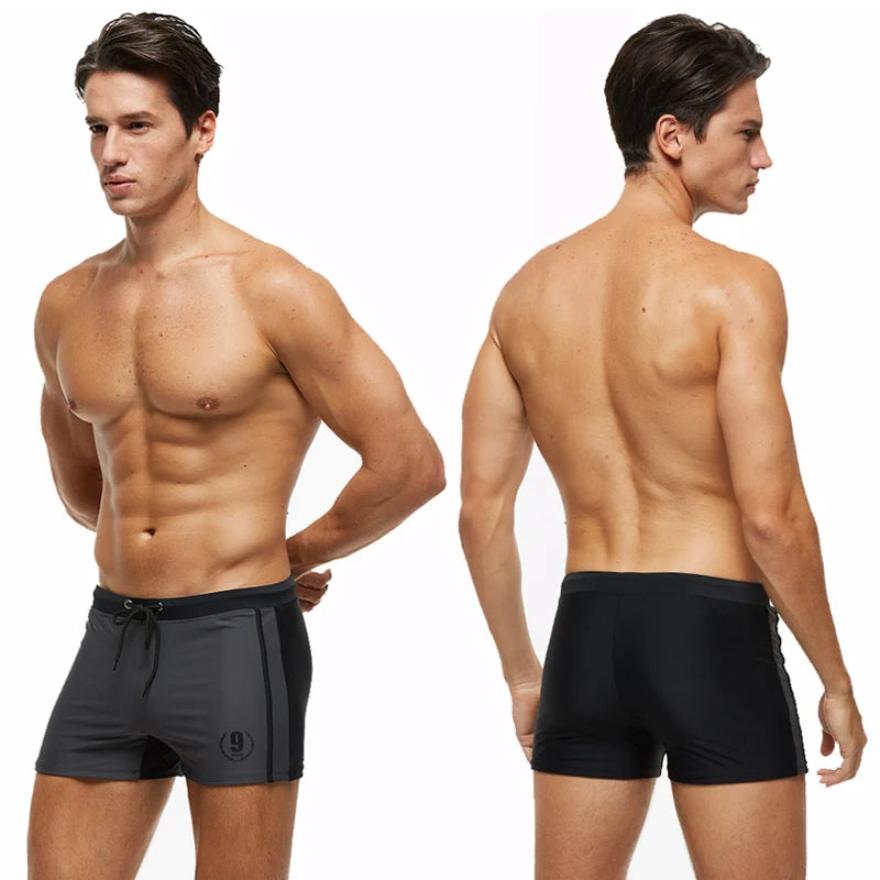 Lange Herren-Shorts mit Polyesterfutter und seitlicher Reißverschlusstasche – ideal für Fitnessstudio und Schwimmen