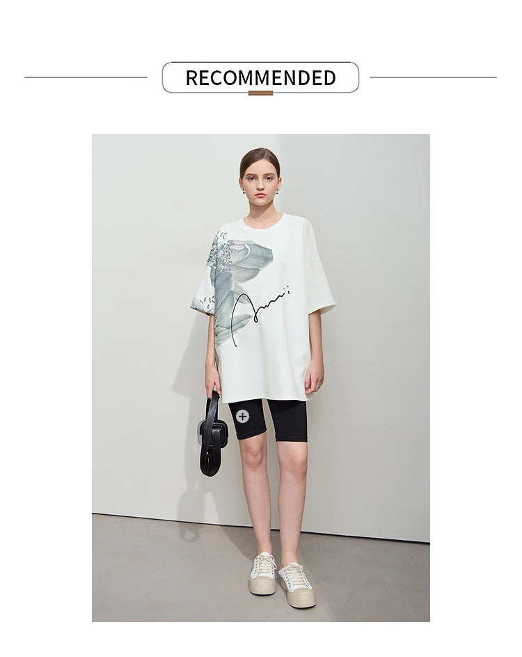 Damen T-Shirt mit lockerem O-Ausschnitt und Blumenmuster sowie Stickerei