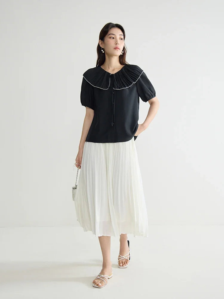 Elegante schwarze Bluse mit französischem Flair und figurformender Silhouette – Sommer-Textur für große Größen
