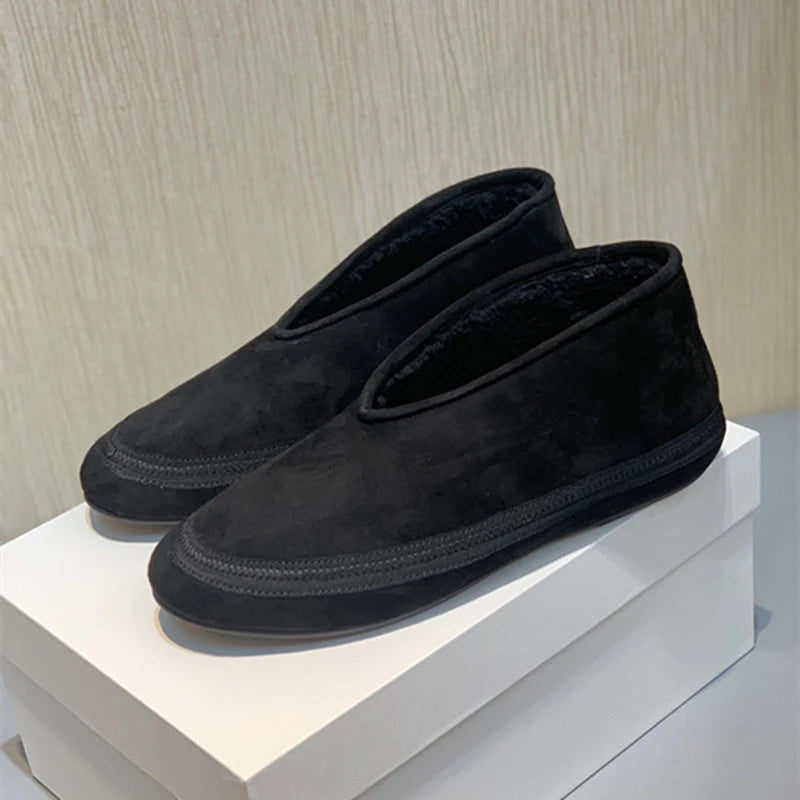 Schwarze flache Winterstiefeletten mit Slip-On-Design und weichem Futter