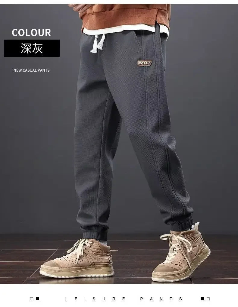 Herrenhosen Herbst und Winter Japanische Krawatten Lose Sport Kordelzug Warme Freizeithosen