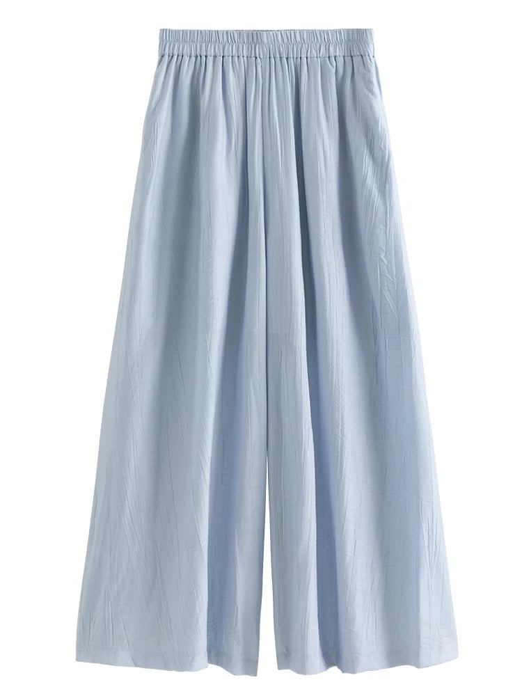 Damen T-Shirt mit V-Ausschnitt in sanftem Apricot – vielseitiges, kurzes Design für den Sommer und den Arbeitsalltag