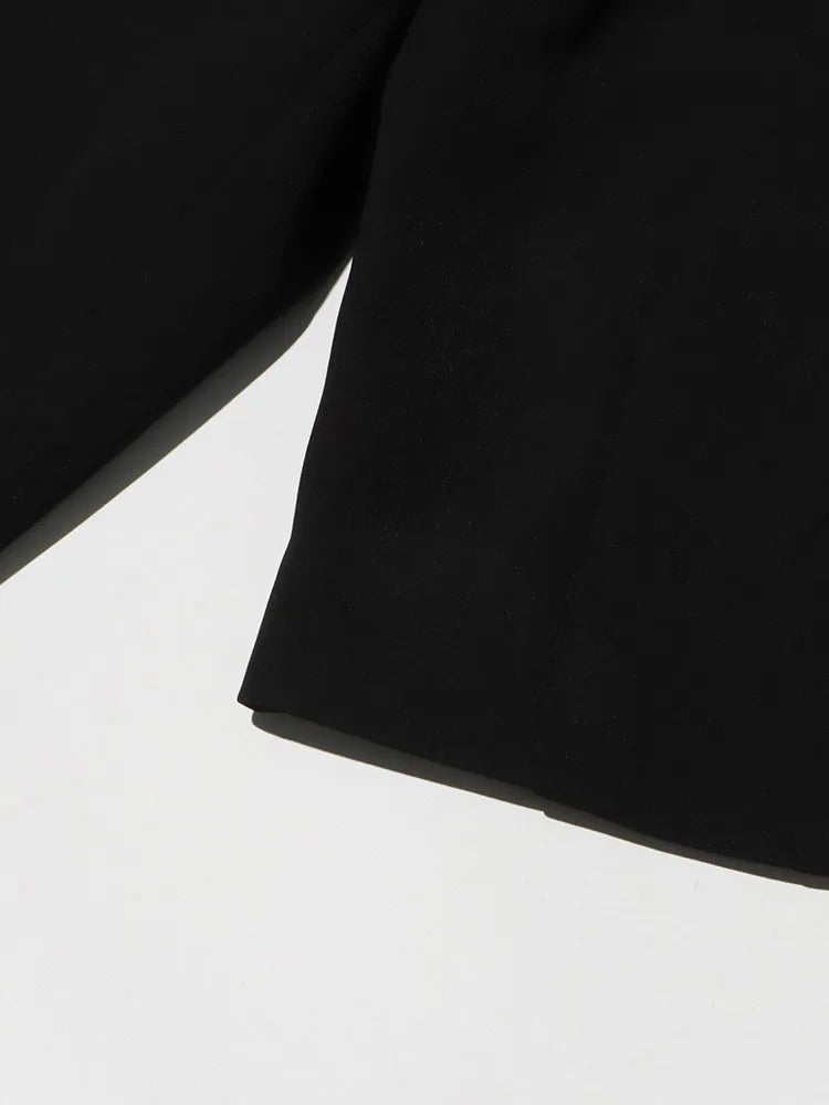 Eleganter Damen-Blazer mit Reverskragen und langen Ärmeln – Patchwork-Design und einreihiger Verschluss für einen lässigen Look.