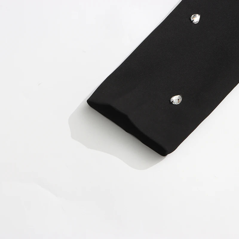 Elegantes Damenkleid mit Rundhalsausschnitt, langen Ärmeln und Patchwork-Design in lockerer Passform.