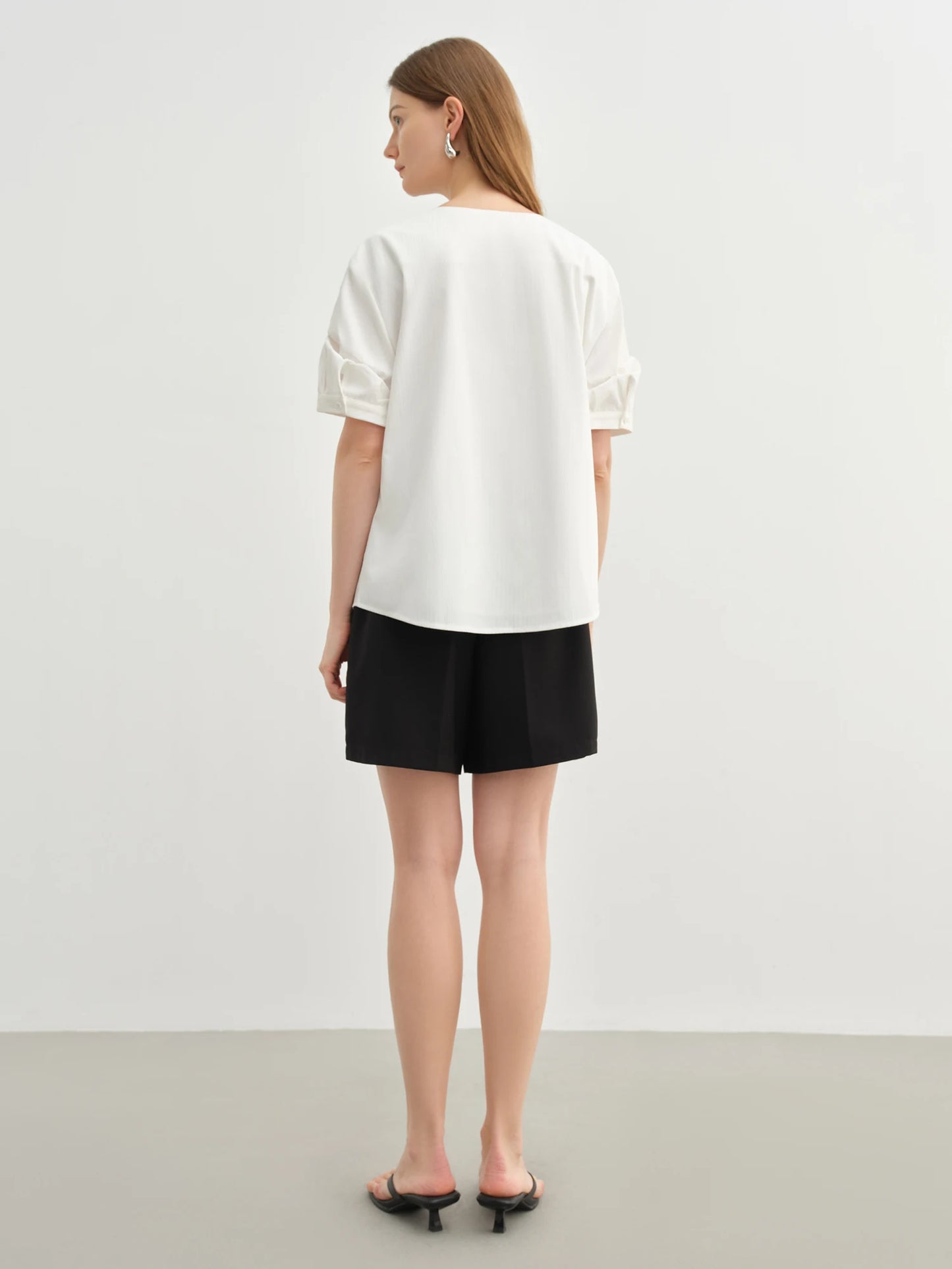 Damen-Polo-Shirt aus Baumwolle mit Polokragen, tailliertem Schnitt und abgerundetem Saum – ideal für den Sommer und den Alltag