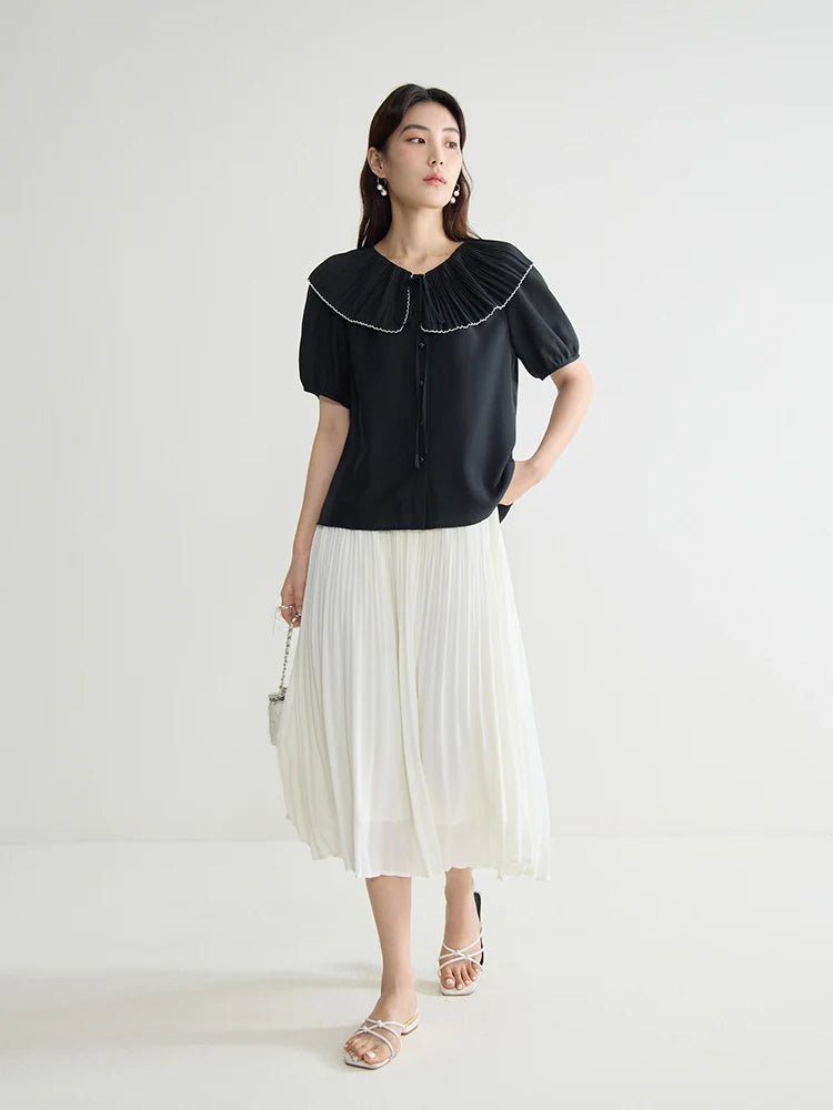 Elegante schwarze Bluse mit französischem Flair und figurformender Silhouette – Sommer-Textur für große Größen