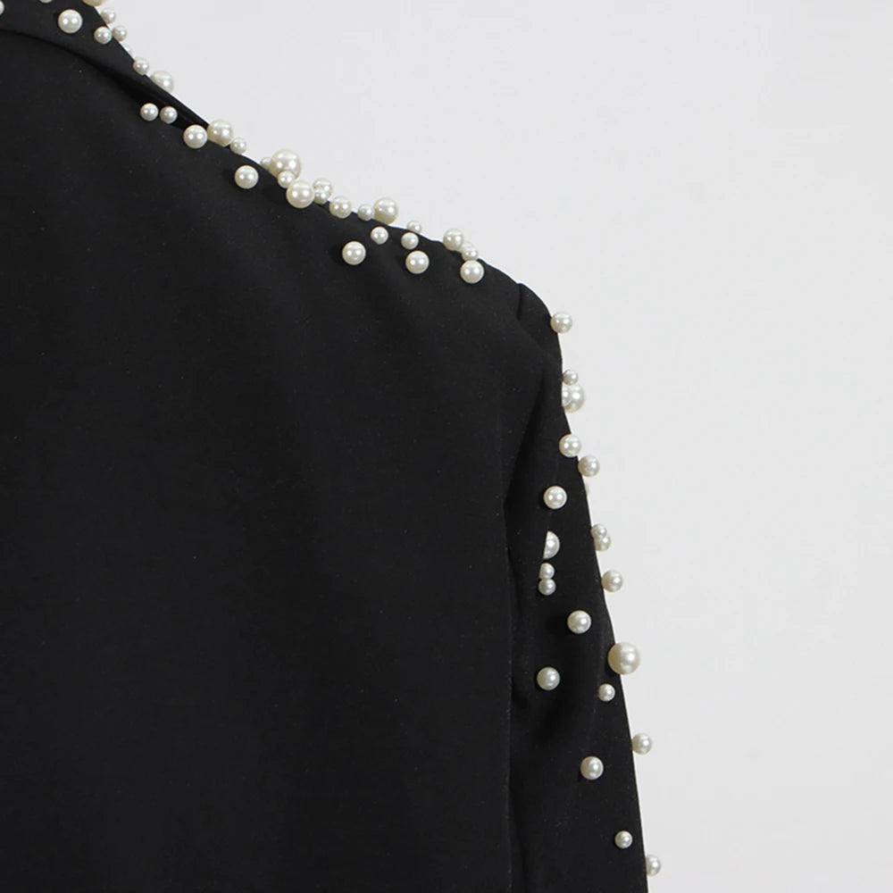 Streetwear-Zweiteiler für Damen mit Stehkragen, Langarm-Top und hoch taillierter, weit geschnittener Hose – modisches Set für Frauen.