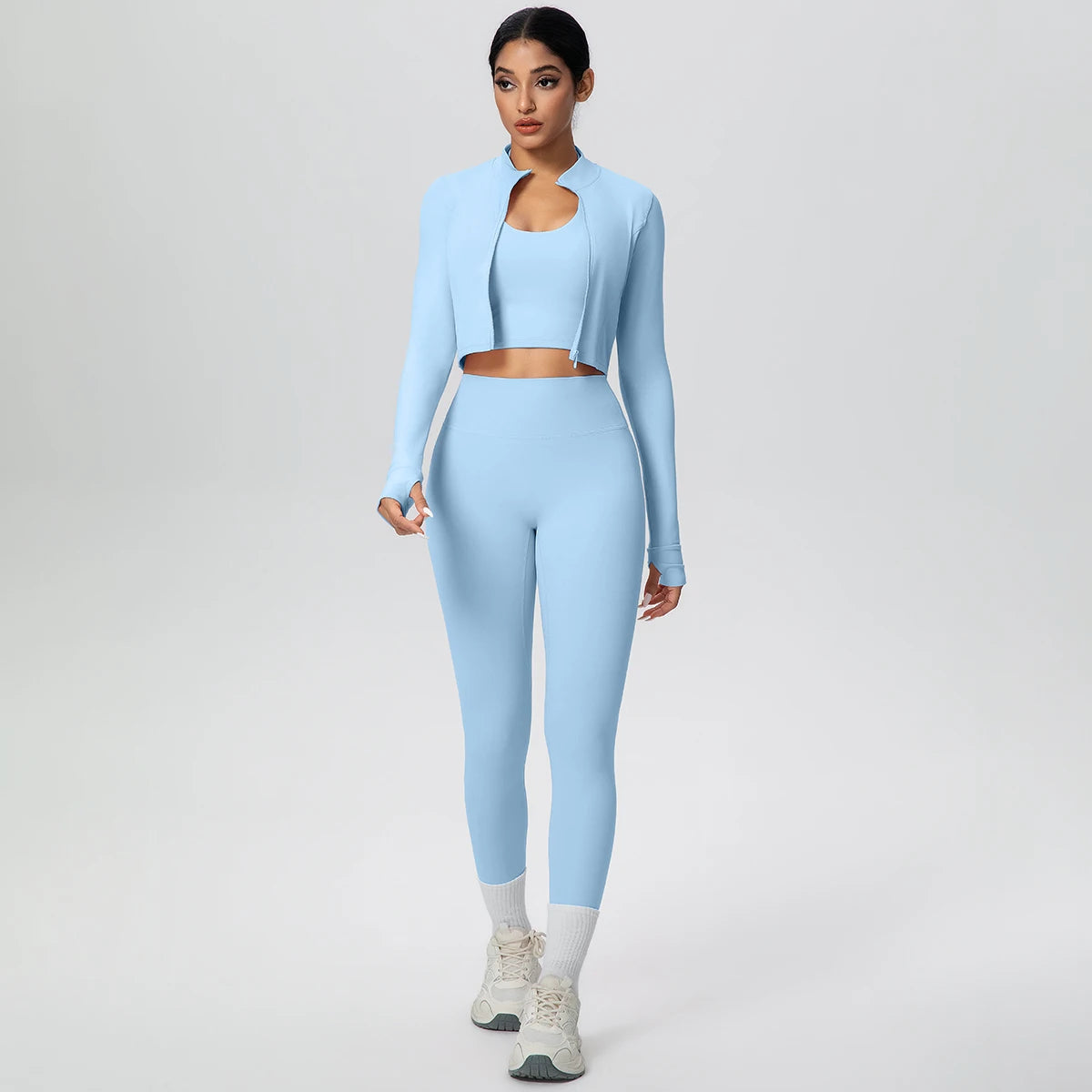 Yoga-Set in Hellblau: langarm Crop-Jacke und hochtaillierte Leggings