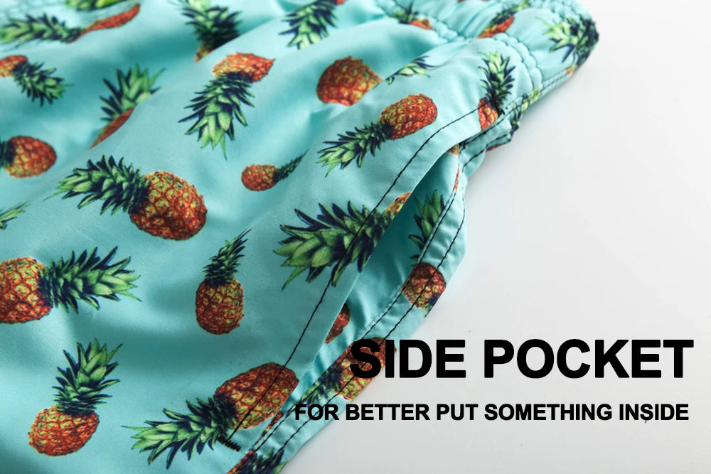 Kurze Herren-Shorts mit Print, Reißverschlusstaschen und schnelltrocknendem Material – ideal für Strand und Sport.