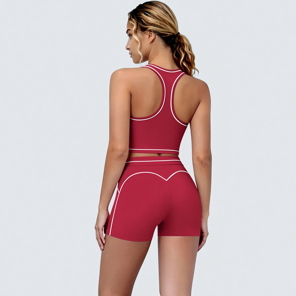Yoga-Set für Damen: Sport-BH und kurze Leggings, dunkelrot mit hellem Kontrast.