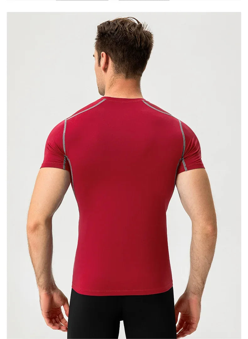 Eng anliegendes Herren-Fitness-Trainingsset mit kurzen Ärmeln – elastisch und schnelltrocknend, ideal für Sport und Laufen.