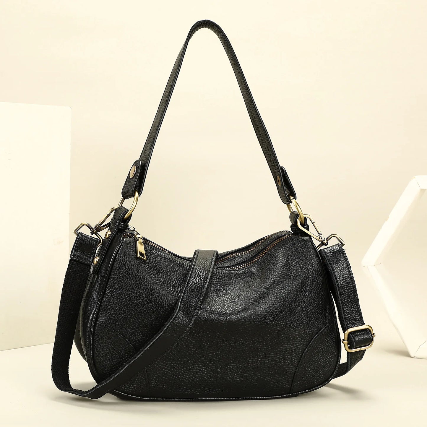 Damen-Schultertasche aus Leder, schwarz, halbmondförmig, zwei kurze Henkel und Schulterriemen