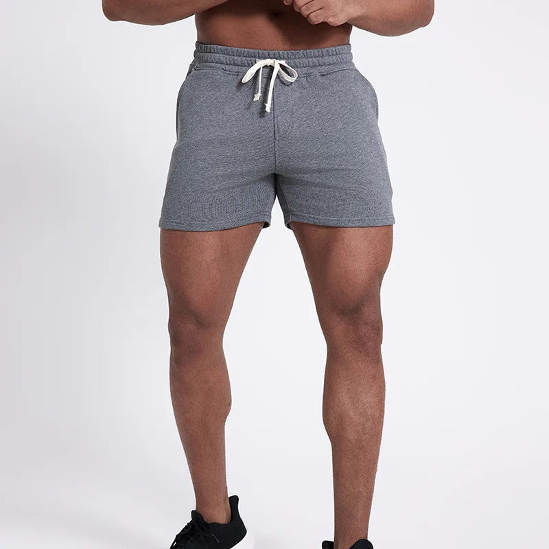 Lässige Herren-Arbeitsshorts mit mehreren Taschen und mittlerer Länge – ideal für den Sommer.