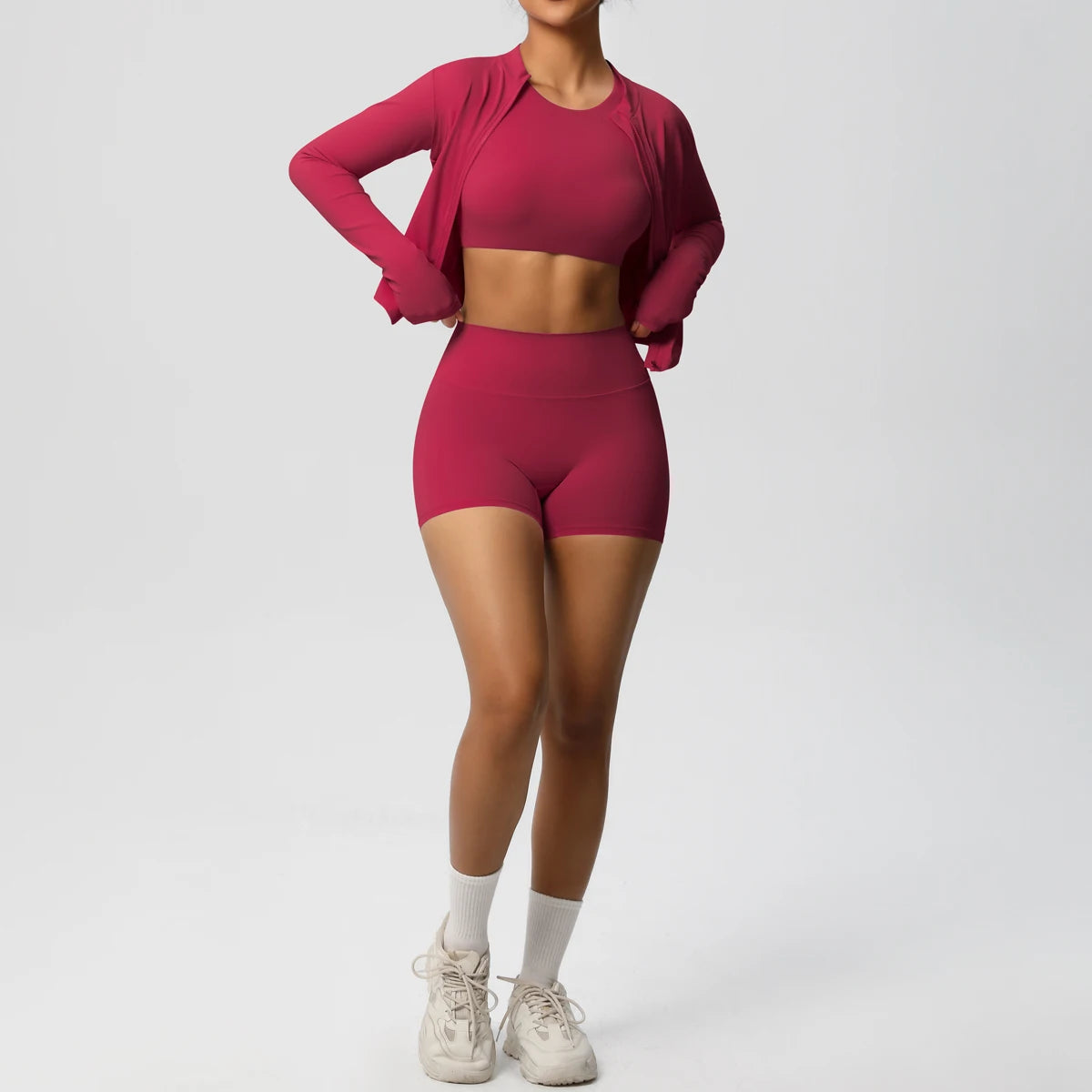 Rotes Damen Yoga-Set: langärmliges Crop-Top und kurze Radlerhose
