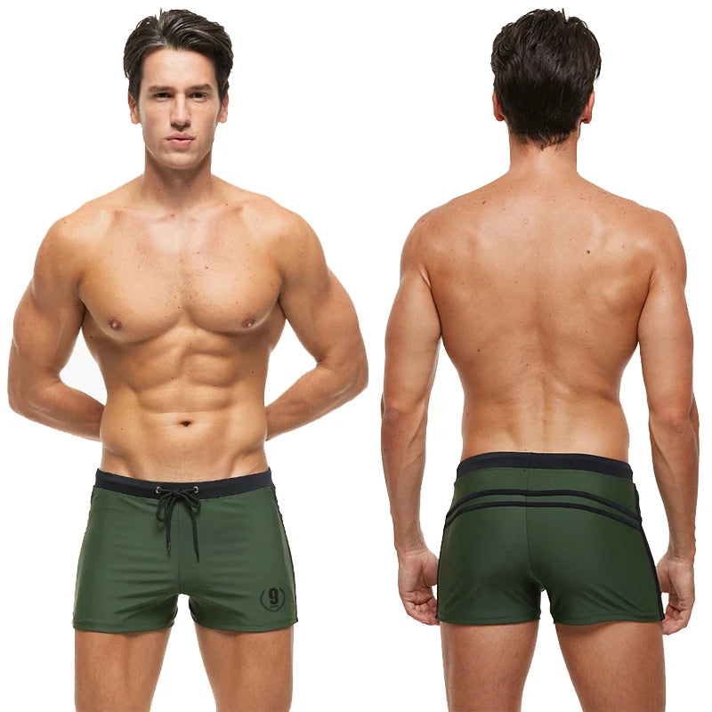 Lange Herren-Shorts mit Polyesterfutter und seitlicher Reißverschlusstasche – ideal für Fitnessstudio und Schwimmen