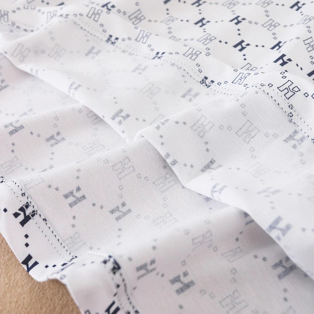 Bedrucktes Polokleid für Mädchen mit marineblauem Kragen, kurzärmliges A-Linien-Kleid mit Monogramm-Muster, weiße Sommerkleider für Kinder