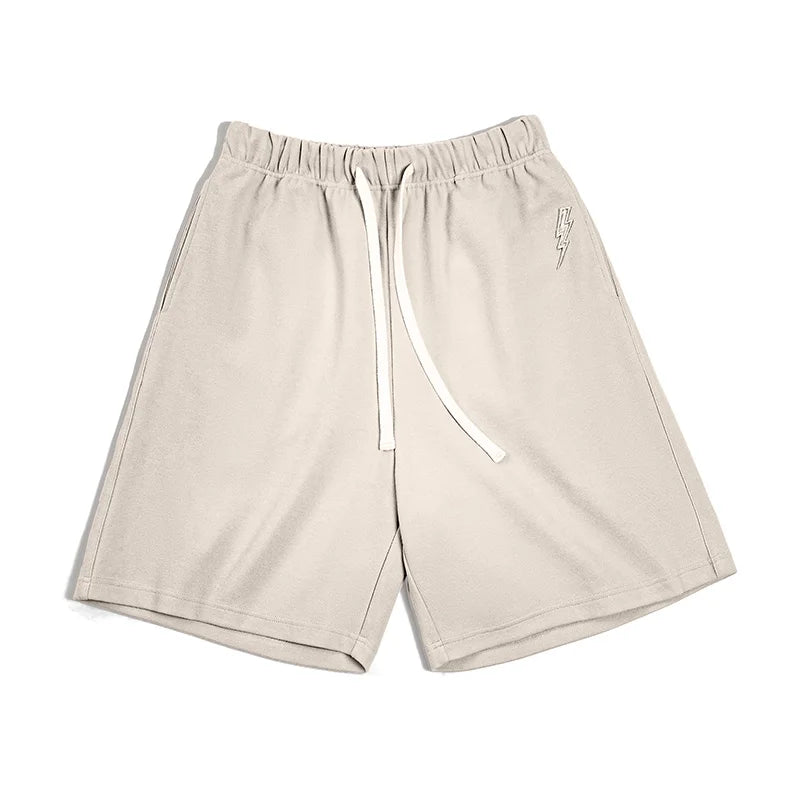 Herren-Freizeitshorts beiger Farbton mit Kordelzug und gesticktem Blitzdesign