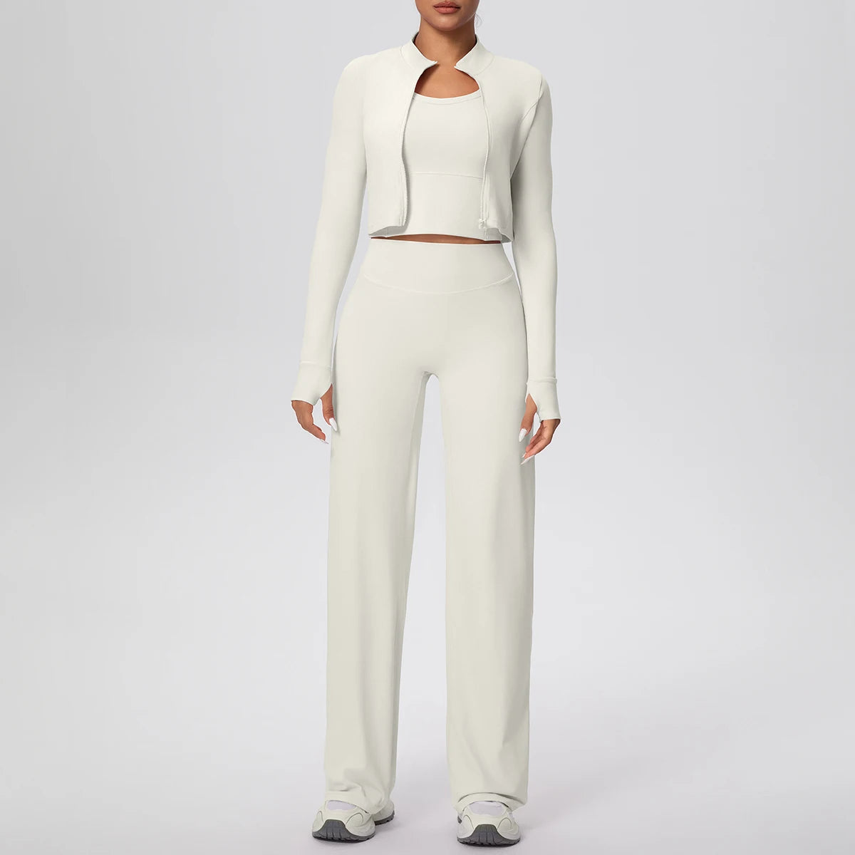 Yoga-Set: hellbeiges Zip-Jacke-Crop mit langen Ärmeln und weiter Hose