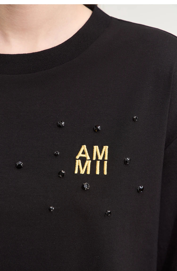 Damen T-Shirts im Minimalismus-Stil mit Stickerei und lässigen Ärmeln