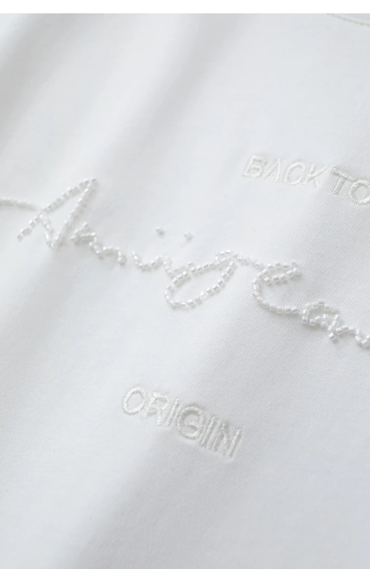 Damen T-Shirts im Minimalismus-Stil mit Kurzarm und Buchstaben-Stickerei