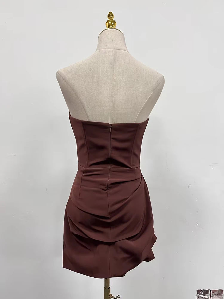 Elegantes Damenkleid mit Rundhalsausschnitt, kurzen Ärmeln und Patchwork-Design mit Quasten und Falten.