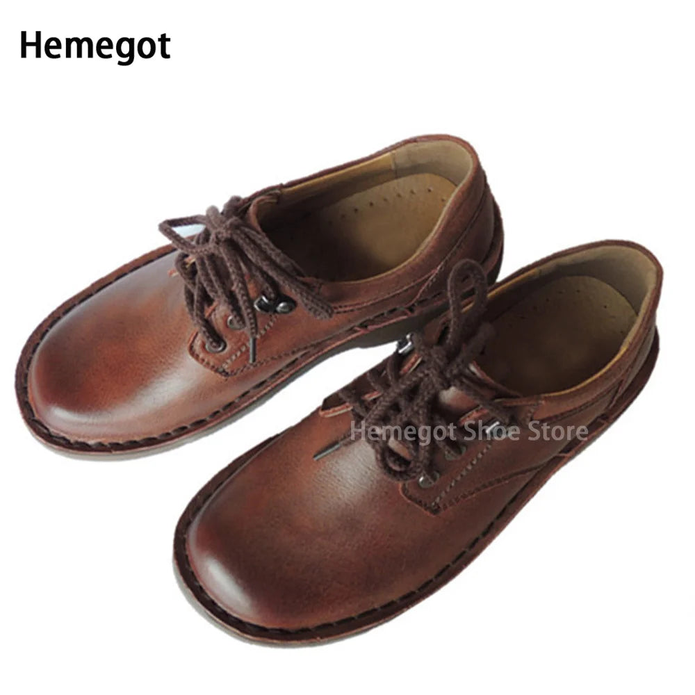 Braune Schnürschuhe mit rundem Zehenbereich, flache Low-Top Arbeitsschuhe