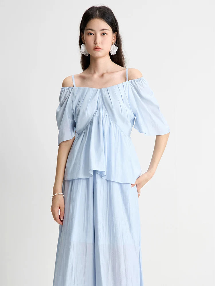 Damen T-Shirt mit V-Ausschnitt in sanftem Apricot – vielseitiges, kurzes Design für den Sommer und den Arbeitsalltag
