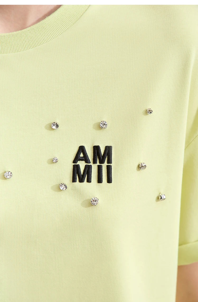 Damen T-Shirts im Minimalismus-Stil mit Stickerei und lässigen Ärmeln