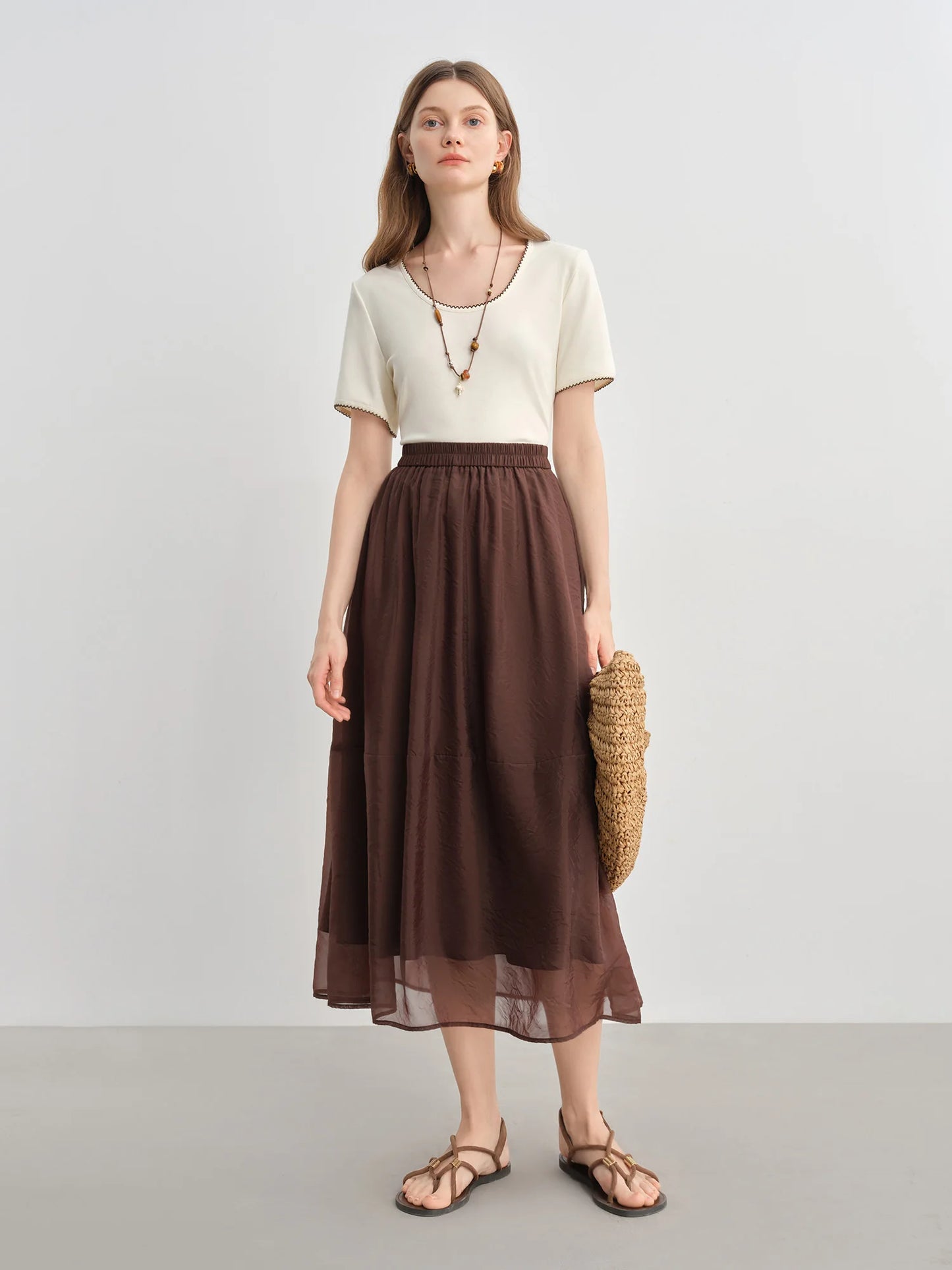 Ärmelloses Plus-Size-Top mit doppeltem Träger und Perlendetails – ideal für den Sommer und den Alltag.