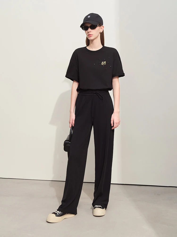Damen T-Shirts im Minimalismus-Stil mit Stickerei und lässigen Ärmeln