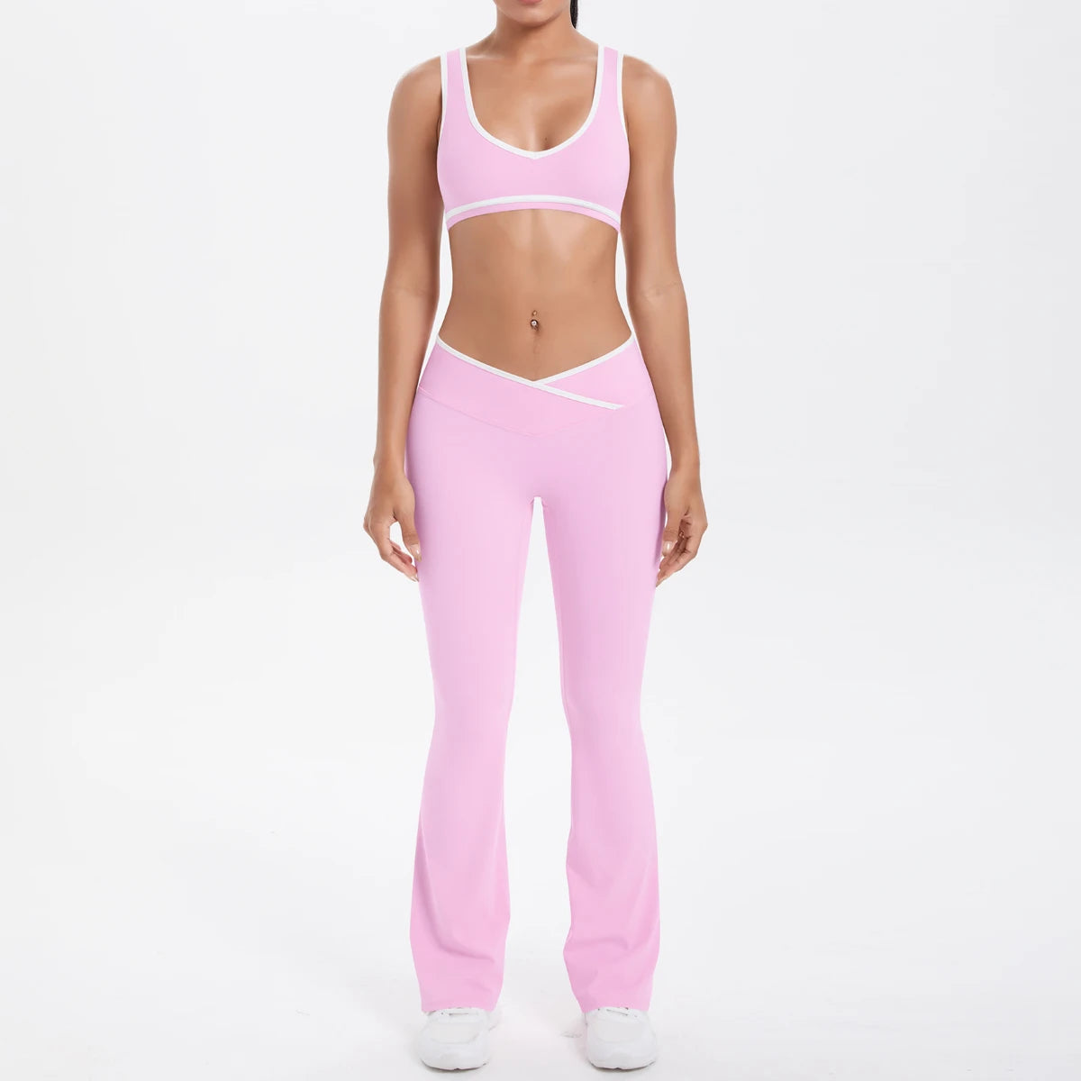 Yoga-Set aus rosafarbenem Sport-BH und hochbundigen Leggings