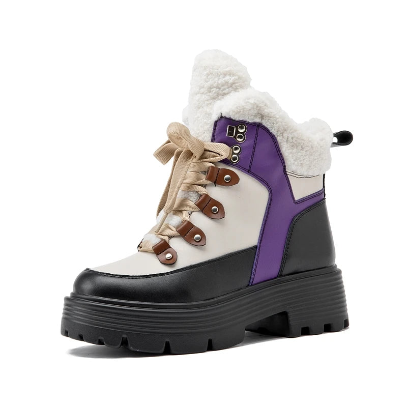 Damen-Snowboots lila-weiß, Schnürung, Plüschkragen und robuste Profilsohle