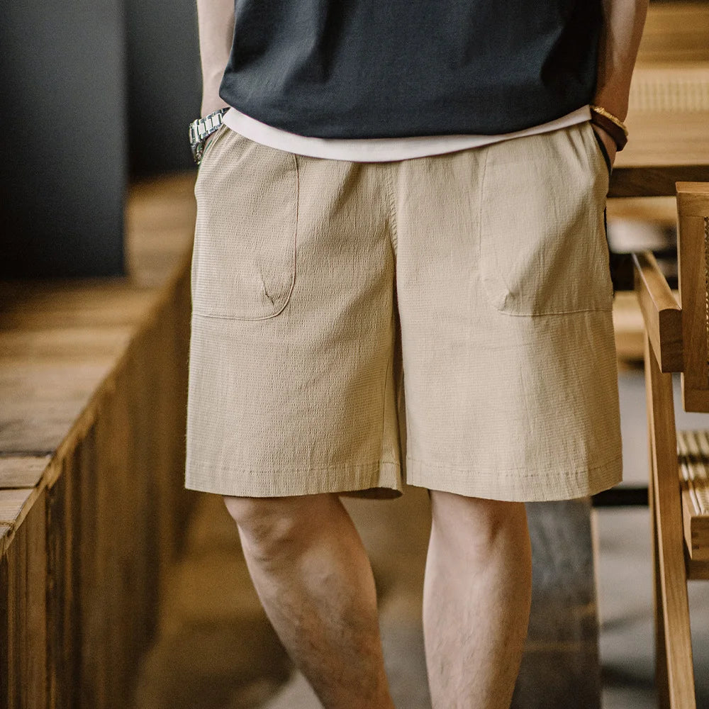 Männer Shorts aus atmungsaktiver Seersucker-Textur mit elastischer Taille und Kontrastfarbe