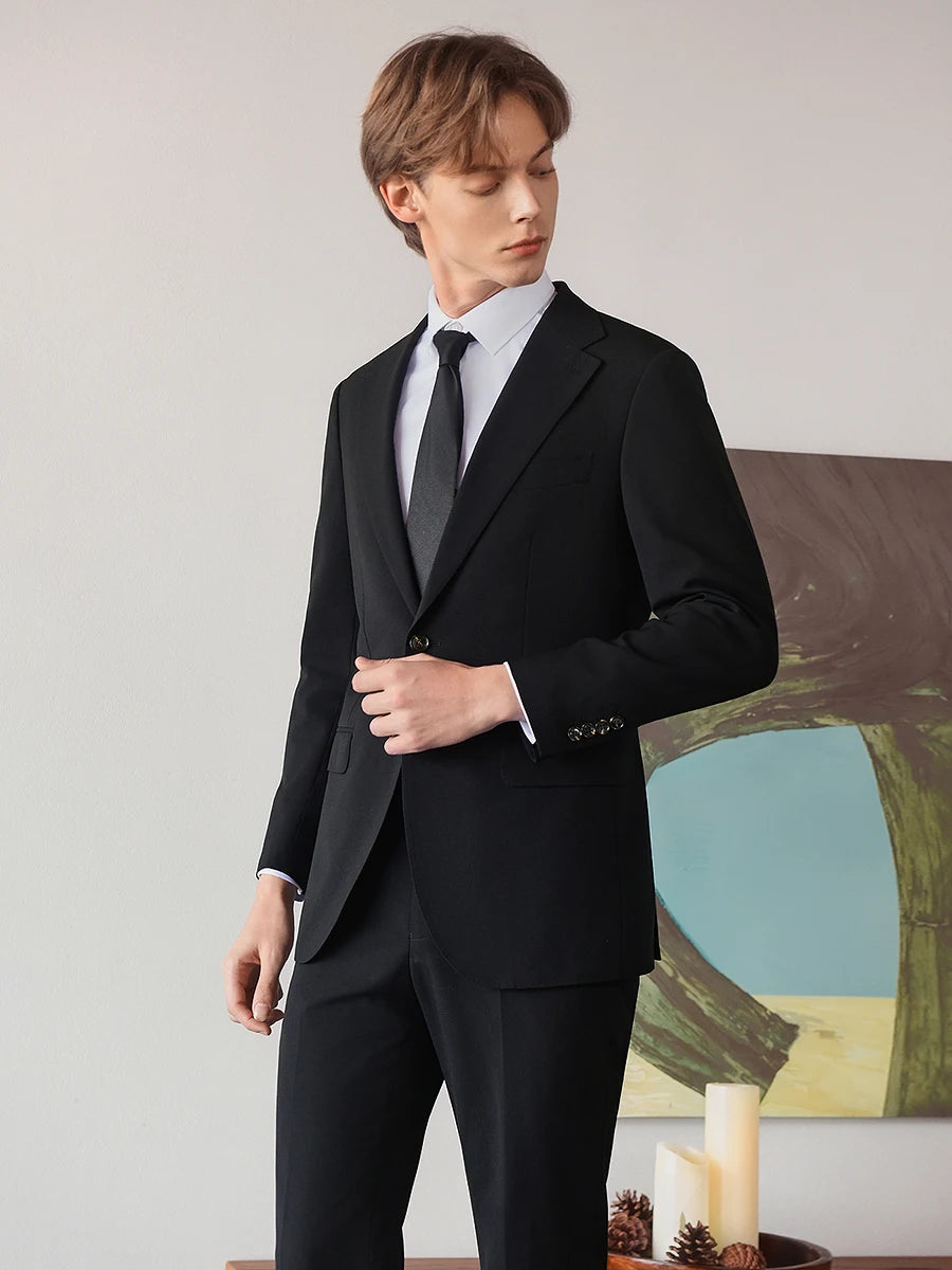 Herrenanzug aus 100% Wolle in tiefem Blau, doppelt geknöpft – ideal für Hochzeit, Dinnerparty oder den täglichen eleganten Auftritt.