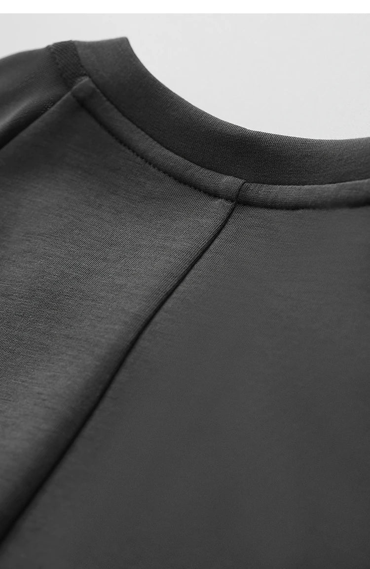 Damen Top im minimalistischen Stil mit O-Ausschnitt und schmaler Passform