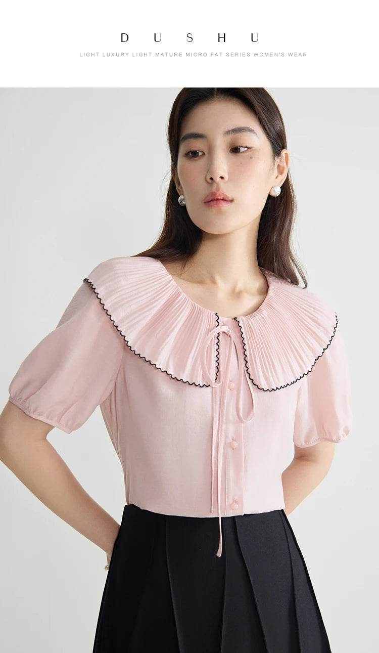 Elegante schwarze Bluse mit französischem Flair und figurformender Silhouette – Sommer-Textur für große Größen