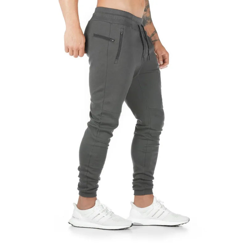 LOGO-freie Muscle Herren Sporthose Herren Fitness Hängende Handtuchhose Lauftraining Fußhose