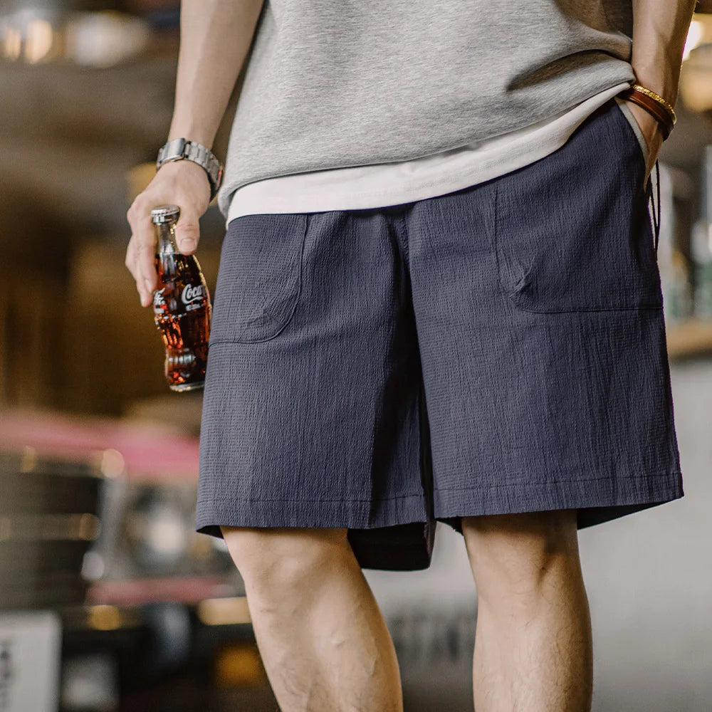 Männer Shorts aus atmungsaktiver Seersucker-Textur mit elastischer Taille und Kontrastfarbe
