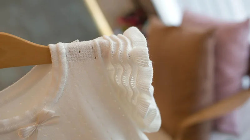 Mädchen Weste aus Strick für Sommer mit süßem Lochmuster in Einfarbig