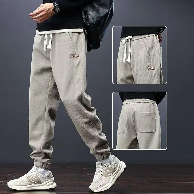 Herrenhosen Herbst und Winter Japanische Krawatten Lose Sport Kordelzug Warme Freizeithosen