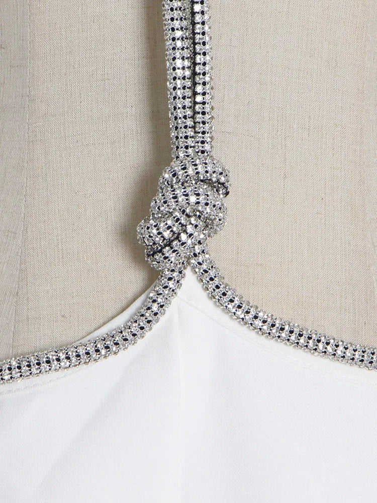 Elegantes Midi-Kleid mit Pailletten und Patchwork, schulterfrei und langärmelig – figurbetontes Design für Damen.