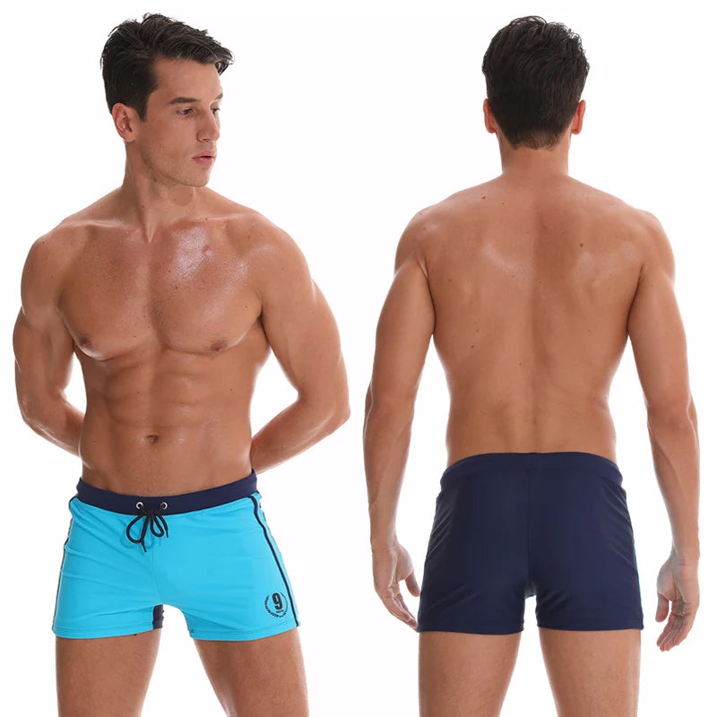 Lange Herren-Shorts mit Polyesterfutter und seitlicher Reißverschlusstasche – ideal für Fitnessstudio und Schwimmen