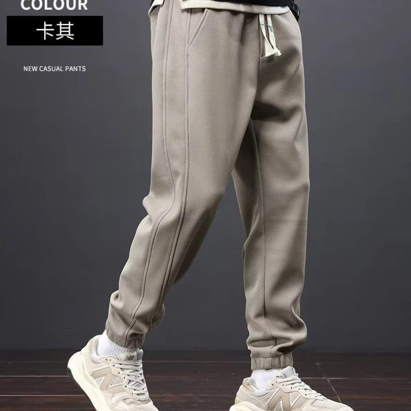 Herrenhosen Herbst und Winter Japanische Krawatten Lose Sport Kordelzug Warme Freizeithosen