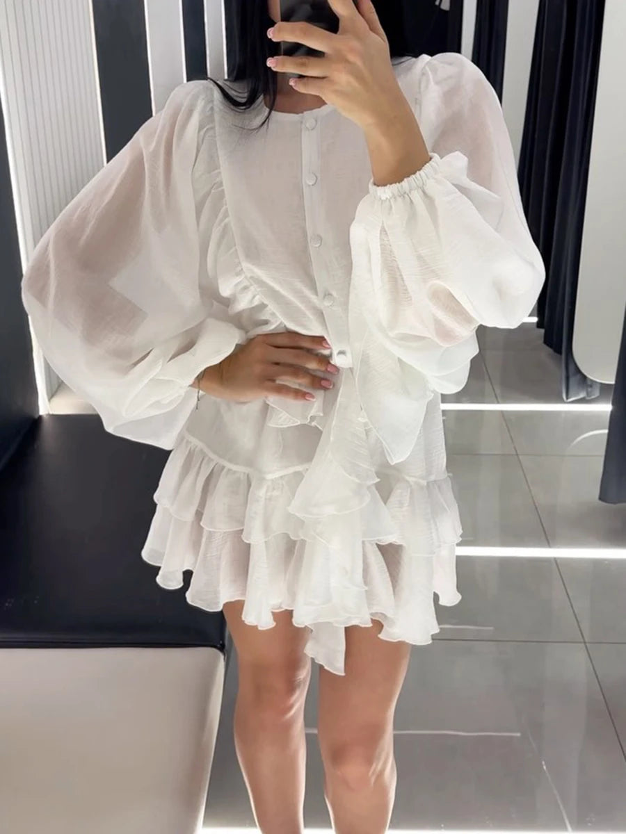 Asymmetrisches ärmelloses Damenkleid mit Rundhalsausschnitt, Hohldesign und Stickerei – figurbetont und elegant.
