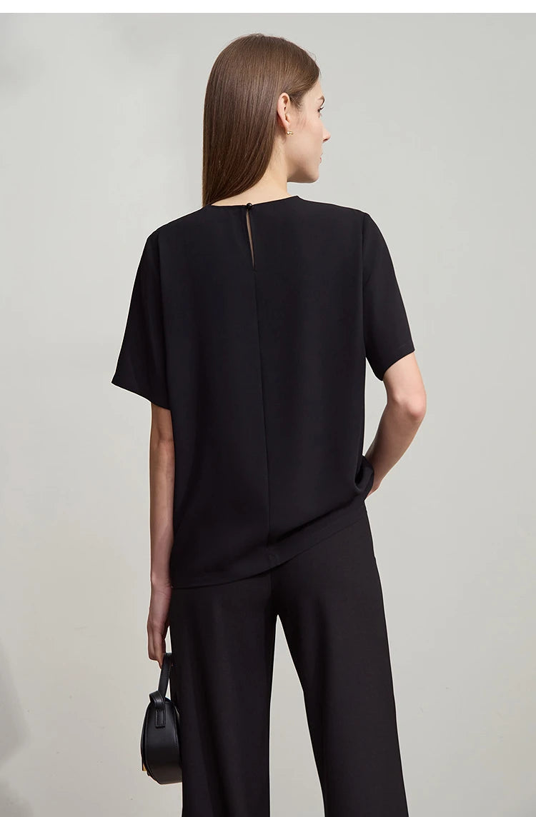 Damen Top im minimalistischen Stil mit elegantem O-Ausschnitt und Pailletten-Blume