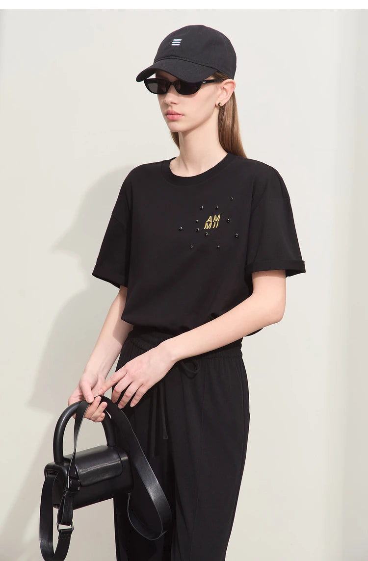 Damen T-Shirts im Minimalismus-Stil mit Stickerei und lässigen Ärmeln